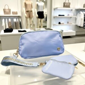 Lululemon Everywhere Crossbody Sling Bag & 2 Mini wallet keychain set .